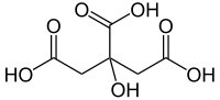 citric acid, present in apples as a result of the Krebs Cycle